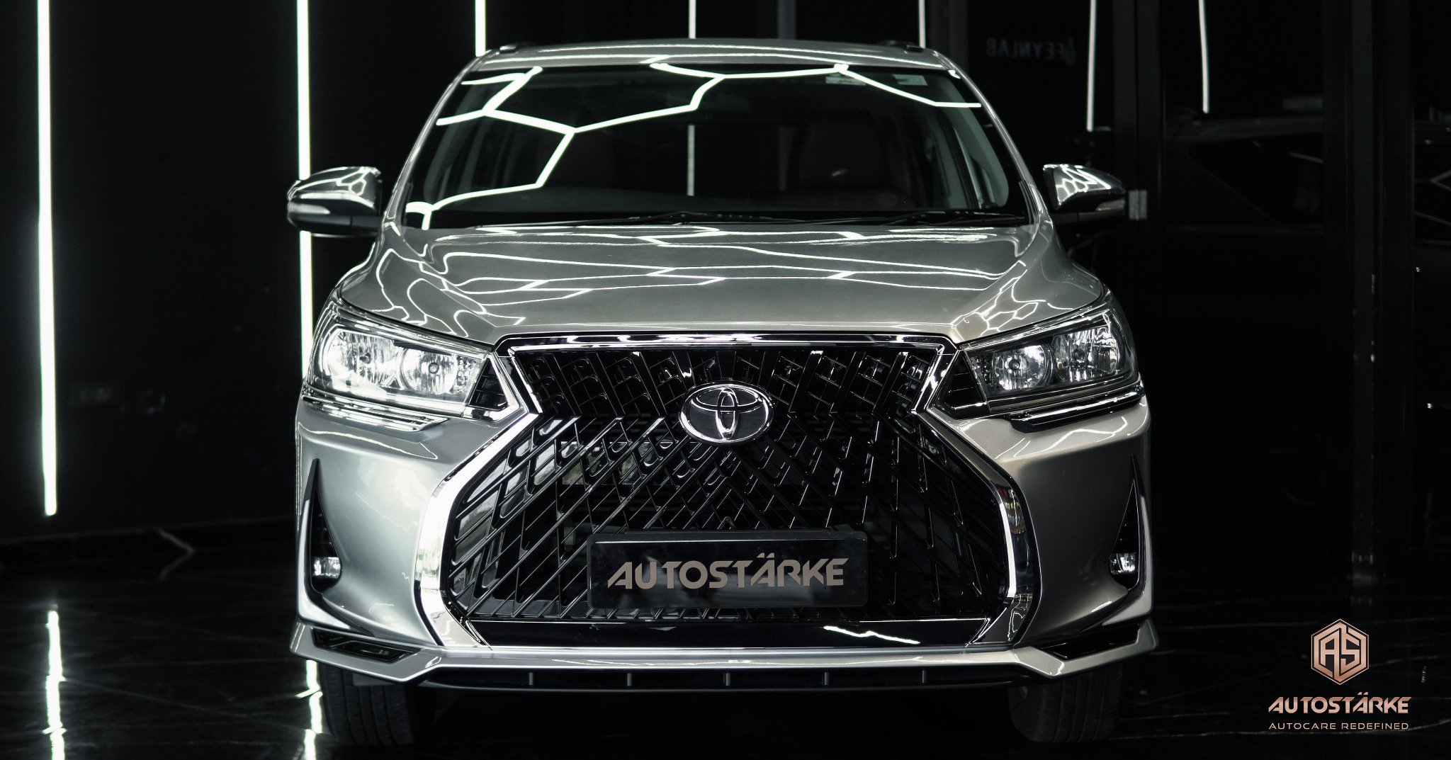 Lexus body kit installation in Innova Crysta by Autostarke.