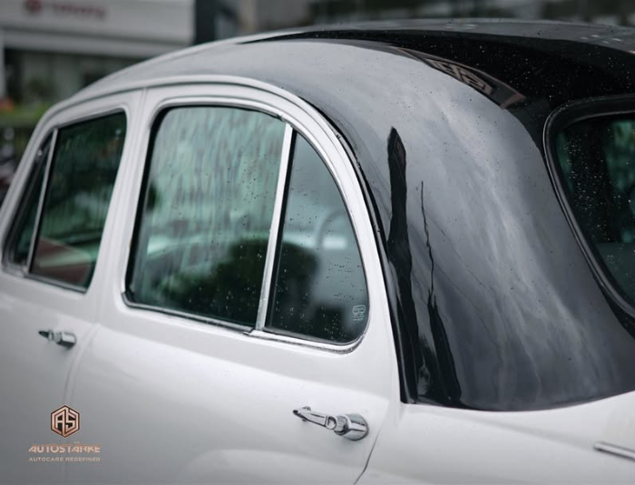 Restored classic white Ambassador with vintage detailing